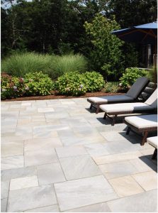 backyard patio with reclining chairs