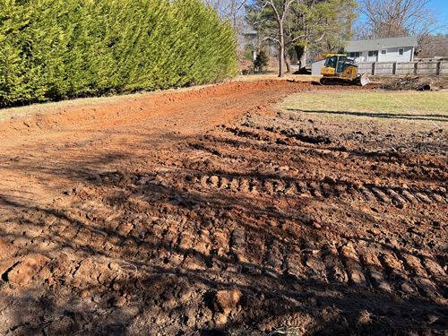 grading for building and sod installation